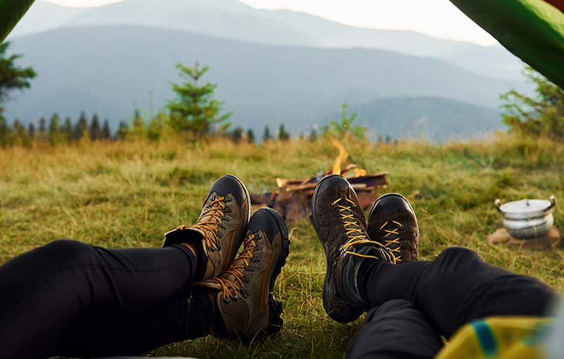 man-woman-inside-tent-together-majestic-beautiful-landscape-untouched-nature